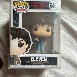Funko Pop Eleven Figure with Brown Hair and Blue Outfit
